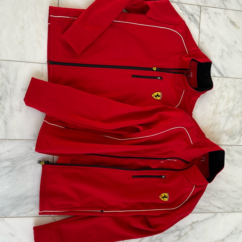 Ferrari Jackets. One small, one XL. Can we sold seperately